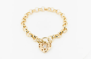 Rose gold bracelet with heart locket In 9ct gold