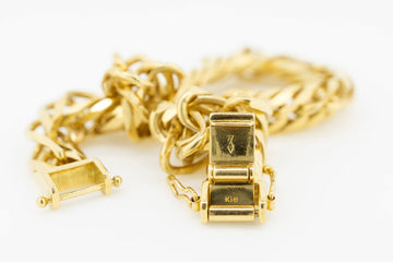 18ct gold link bracelet with unique link