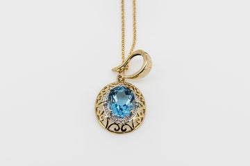 9CT GOLD CHAIN WITH BLUE TOPAZ PENDANT