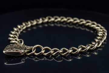 9CT GOLD BRACELET WITH HEART LOCKER