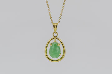 Jade pendant with solid 14k yellow gold
