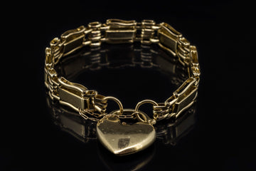 9CT GOLD GATE BRACELET WITH HEART LOCKER