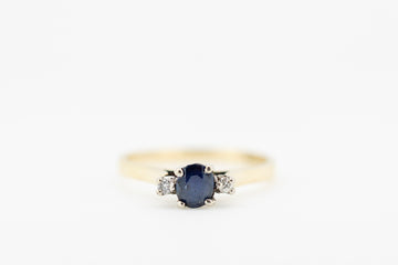 Blue Sapphire and diamond set in 14ct gold ring