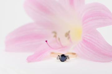 Blue Sapphire and diamond set in 14ct gold ring