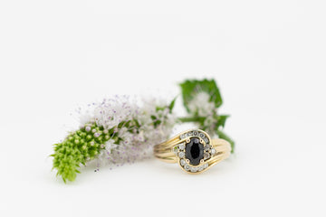 Blue sapphire and diamond in a 9ct gold ring