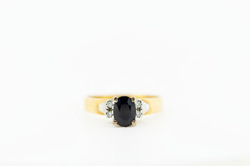 18ct gold ring with blue Sapphire and Diamonds