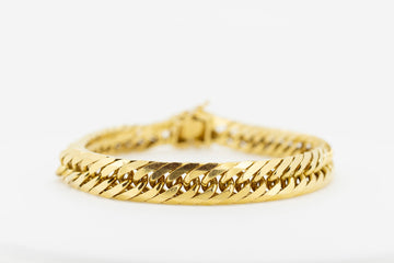 18ct gold link bracelet with unique link