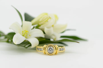 18ct Yellow Gold Ring With Round Bezel Set Center Diamond With 6 Channel Set Accent Stones #27898-3