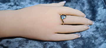 9CT gold ring with Aquamarine and diamond