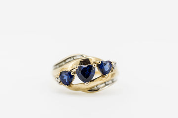9CT GOLD WITH THREE HEART SHAPED SAPPHIRES