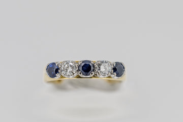 18CT YELLOW GOLD DIAMOND AND BLUE SAPPHIRE RING