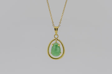 Jade pendant with solid 14k yellow gold