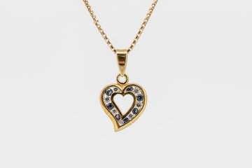 9ct gold diamond and sapphire heart pendant and chain.