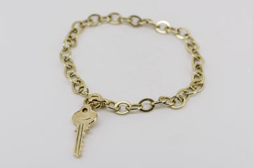 14ct solid yellow gold bracelet with key pendant