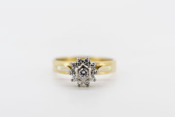 18CT gold diamond cluster ring with floral design