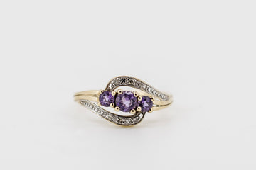 9ct gold ring with amethyst stones