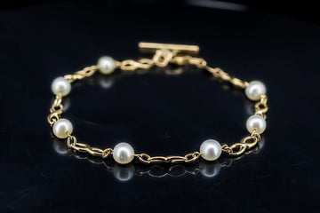 9CT GOLD FOB CHAIN BRACELET WITH SEVEN PEARLS
