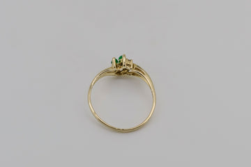 9ct solid yellow gold ring with a diamond and two synthetic emeralds