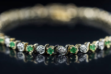 9ct yellow gold and emerald bracelet