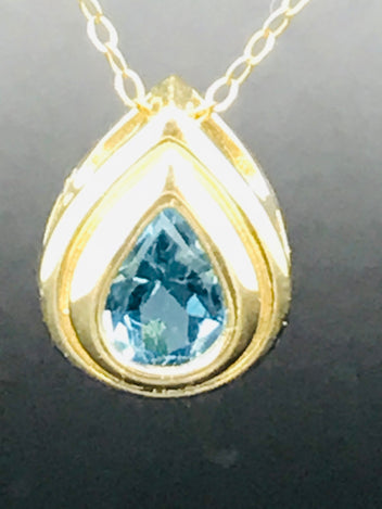 9ct gold blue topaz pendant and earring set 1214