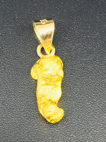 24ct gold nugget pendent.