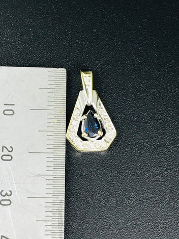 9ct white gold sapphire and diamond pendant